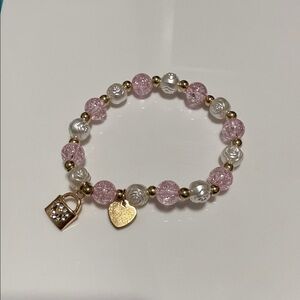 Elegant Pink and Gold Charm Bracelet